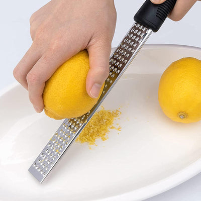 WizzyMart 💡 🍳 Lemon Zester with Ergonomic Handle for Easy Grating in Kitchen and Home 🍳 💡 – cooking, home, lemon zester, how to zest lemon, best lemon zester uk, citrus zester tool, kitchen zester, handheld lemon grater, flat lemon zester, ergonomic kitchen tool, cooking utensils uk, fruit zester for home, easy lemon zester, zester for citrus fruit, kitchen gadget for zesting, lemon peel grater, compact kitchen zester, home cooking tools, small kitchen gadgets
