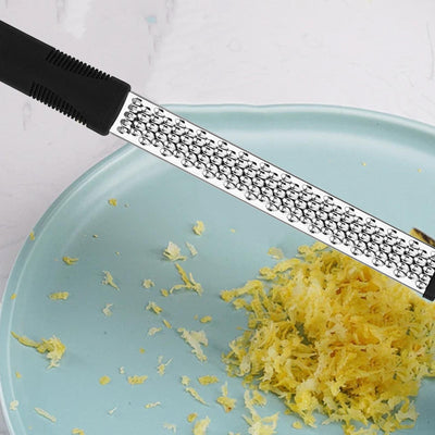 WizzyMart 💡 🍳 Lemon Zester with Ergonomic Handle for Easy Grating in Kitchen and Home 🍳 💡 – cooking, home, lemon zester, citrus zester, kitchen zester tool, flat lemon zester, ergonomic kitchen gadget, easy grip lemon zester, fruit zester for cooking, home kitchen zester, restaurant citrus tool, compact lemon grater, non-slip handle zester, zester for cooking, handheld zester tool, kitchen citrus grater, zester for lemons and limes, small kitchen gadget, cooking preparation tool, lemon zest tool